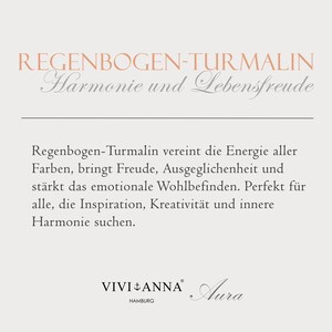 May include: Rainbow Tourmaline, a gemstone known for its vibrant colours and healing properties. The text reads "Regenbogen-Turmalin Harmonie und Lebensfreude" which translates to "Rainbow Tourmaline Harmony and Joy of Life".