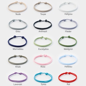 May include: A set of 15 colorful braided bracelets in various colors, including nude, taupe, light gray, gray, charcoal, lavender, navy blue, eucalyptus green, forest green, khaki, pink, light blue, turquoise, and red.