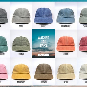 May include: A collection of 15 washed dad caps in various colors, including black, grey, blue, light blue, sage green, bottle green, khaki, coral, red, pink, mustard, brown, beige, and cream. The caps are arranged in a grid pattern on a white background. The text "WASHED DAD CAPS" is displayed in the center of the image.