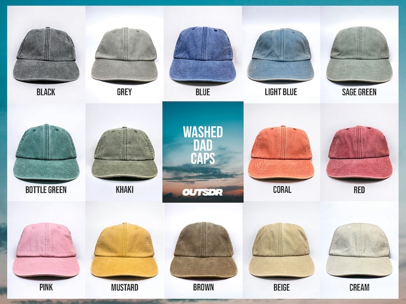 May include: A collection of 15 washed dad caps in various colors, including black, grey, blue, light blue, sage green, bottle green, khaki, coral, red, pink, mustard, brown, beige, and cream. The caps are arranged in a grid pattern on a white background. The text "WASHED DAD CAPS" is displayed in the center of the image.