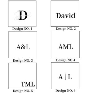 May include: Six different designs for a monogram or nameplate. The designs feature different fonts and styles, including a handwritten font, a bold font, and a font with a decorative ampersand. The designs are labeled with numbers 1 through 6.