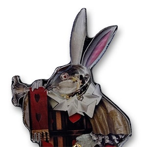 May include: A white rabbit with pink ears wearing a waistcoat and holding a pocket watch. The rabbit is holding a playing card with hearts on it. The rabbit is a character from Alice in Wonderland.