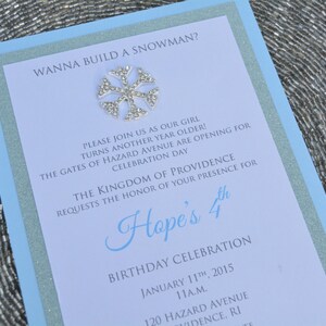 May include: A blue and white invitation with a snowflake design. The invitation is for Hope's 4th birthday celebration. The event will be held on January 11th, 2015 at 11:00 AM at 120 Hazard Avenue in Providence, Rhode Island.