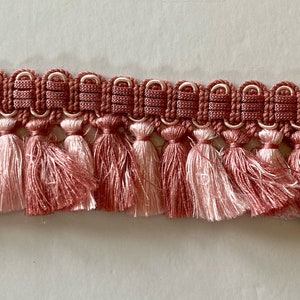 A Collection of fine European Fringe by the yard in Variegated rose 2-1/2&quot; tassel fringe size. Available in a Min. 4-yard increment only.