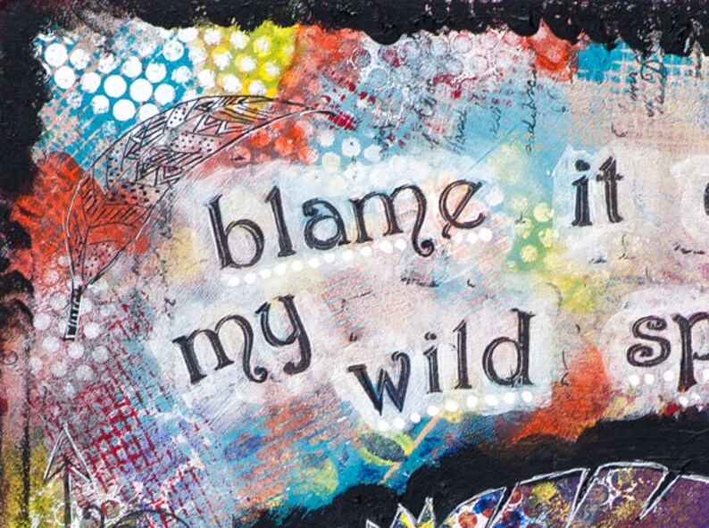Puede incluir: Una pintura abstracta colorida con el texto "blame it on my wild spirit" en letras negras.
