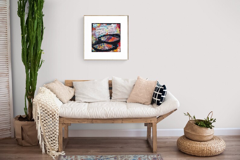 Puede incluir: Una pintura abstracta enmarcada con salpicaduras de pintura de colores y el texto "Believe it or not, wild spirit" en letras blancas.