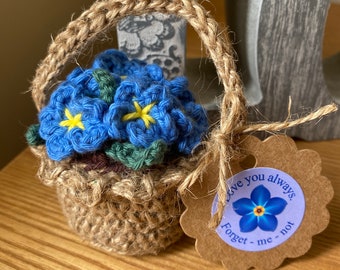 Crochet Forget me not flowers in a jute twine basket. Blue & yellow cotton flowers. Easter flowers.