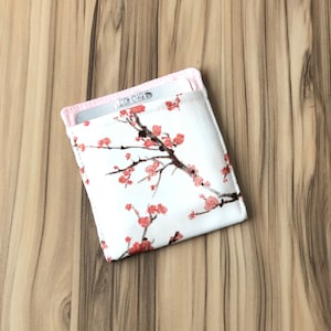 Estuche para pastillas anticonceptivas con diseño de flor de cerezo, minibolsa de tela multiusos, tarjetero, minicartera