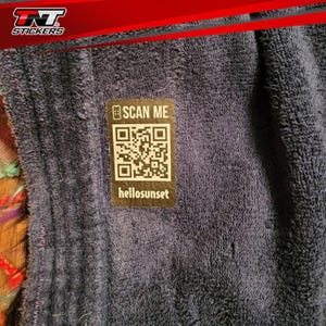 Image of a screen printed heat transfer QR Code applied on a fleece fabric