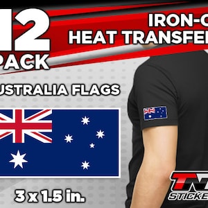 May include: A pack of 12 iron-on heat transfers featuring the Australian flag. Each transfer measures 3 inches by 1.5 inches. The image shows a black t-shirt with an iron-on transfer of the Australian flag on the sleeve.