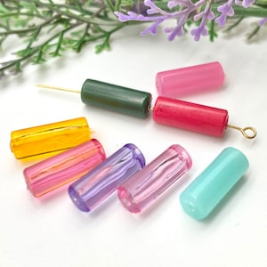 May include: Assortment of colorful glass beads in various shapes and sizes. The beads are perfect for jewelry making, crafting, and other DIY projects.