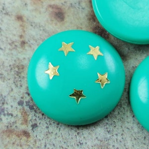 Vintage Turquise plastic Lucite cabochons met gouden sterren ( 4 stuks ) ( 23 mm ) - v4c