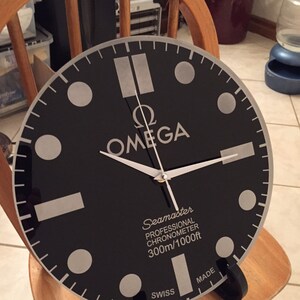 omega wall clock