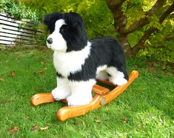 Border Collie rocking puppy.  Hand crafted sheepskin and wood. Heirloom nursery toy.