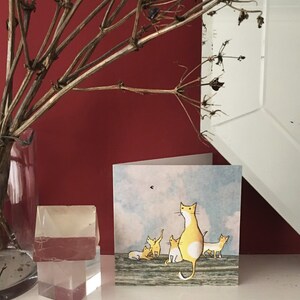 The Fly. A lazy afternoon where a yellow cat and her kittens watch a fly . Printed card from collage original. image 4