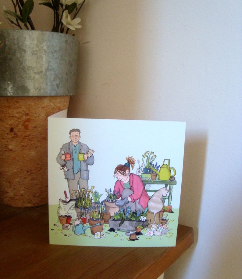 POTTING UP a couple happily pottering in the garden.Printed Etsy