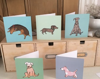 Dippy Dogs .Pack of 5 different dog cards .Each card shows a cheeky dog on a coloured background.Printed cards from collage originals.