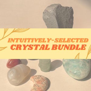May include: A collection of intuitively-selected crystals in various shapes and colors, including a grey rock, a red crystal, a white crystal, a green crystal, a pink and white crystal, and a light blue crystal.  The crystals are arranged on a light beige surface.  "Intuitively-Selected Crystal Bundle" is written in orange text on a yellow background.