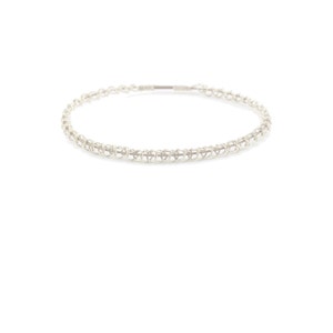 May include: A silver chain necklace with a delicate, interwoven design.