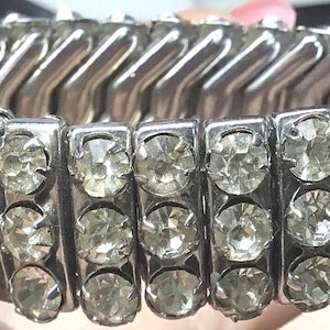 E18 Vintage 1950 Art Deco style, show stopping extendable bracelet. Clear crystal diamanté stones.