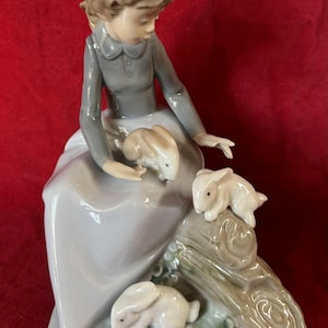 L164 Vintage 1987s NAO by Lladro “Sitting on Garden Girl with Rabbits Bunnies “ Figurine. Handmade in Spain. Free shipping.