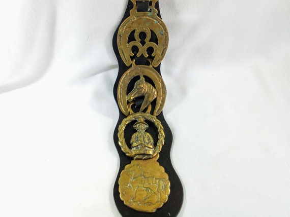 T141 Vintage Horse Brasses on Leather Hanging Strap. Free Global