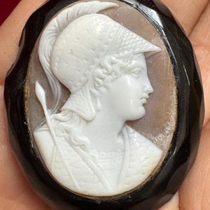 S109 Antique 1890s  Classical Warrior, possibly Athena,  Cameo set in Black Whitby Jet (some damage to the Jet) Brooch. Gift idea.