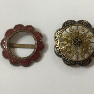 A59  Antique Edwardian brass and enamel buckles or adornments. One guilloche. C1910. Free tracked shipping from the EU.
