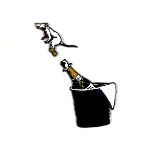 May include: A white rat jumping out of a champagne bottle in a black ice bucket. The rat is wearing brown shoes. The bottle is partially submerged in the ice bucket.