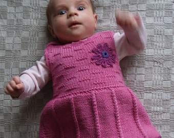 a pink wool knitted dress Pink Merino Wool Toddler Overall Dress: Hand-knitted Cable Knit