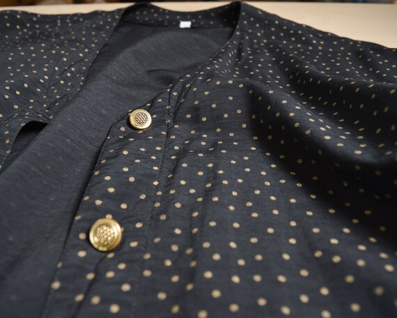 black and gold polka dot shirt