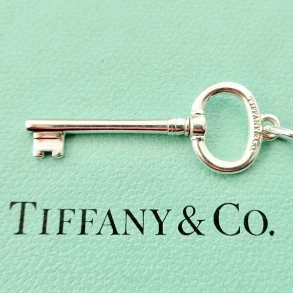Authentic Tiffany & Co. Oval Key Pendant Charm Small Sterling Silver Necklace