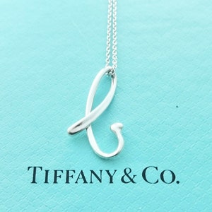 【Tiffany & Co】Elsa Peretti Letter ブレスレット Elsa Peretti® Sterling Silver Open Heart Bracelet | Tiffany