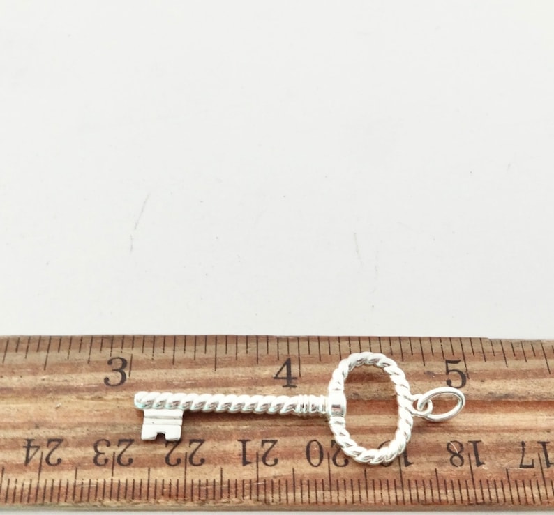 Twisting Key Authentic Tiffany & Co. Oval Twist Key Sterling Silver Twisted Size ...