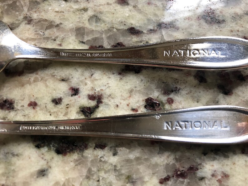 Airline utensils from National Airlines qty 2 set with fork and spoon by the International silver company a rare and unusual defunct airline