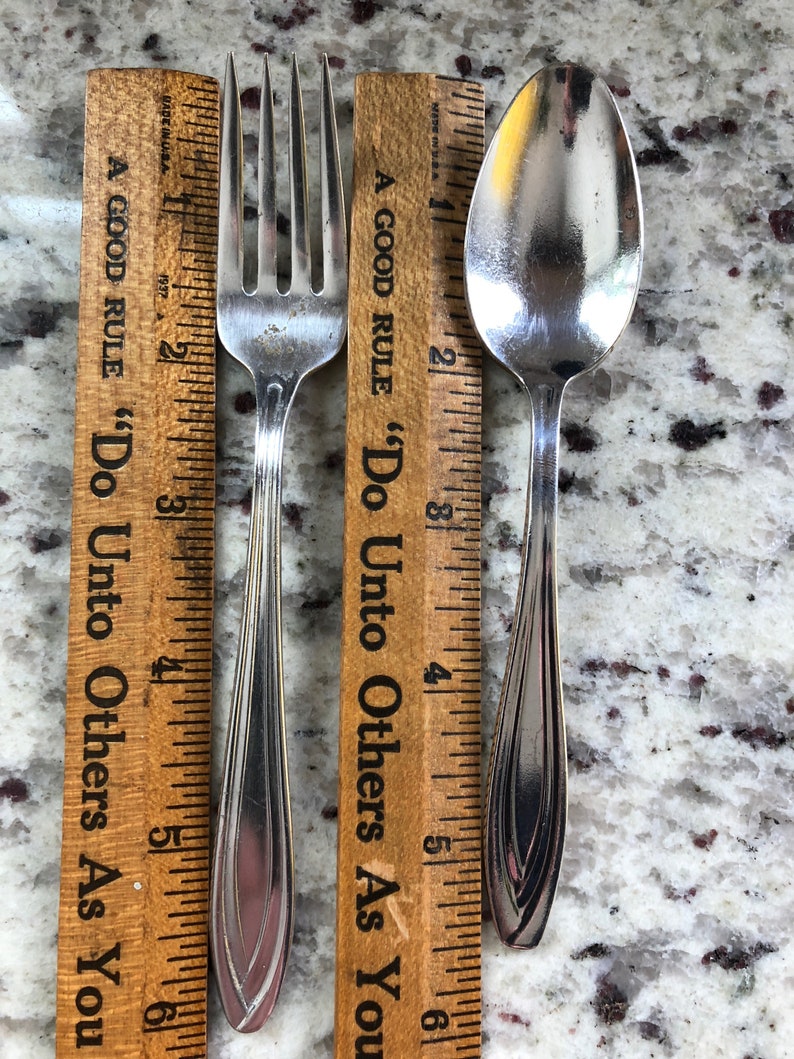 Airline utensils from National Airlines qty 2 set with fork and spoon by the International silver company a rare and unusual defunct airline