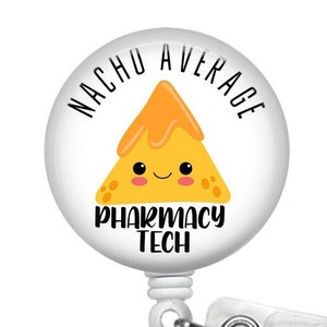 May include: White round badge holder with a white and yellow cartoon image of a nacho chip with a smiling face. The text "NACHU AVERAGE PHARMACY TECH" is printed on the badge holder.
