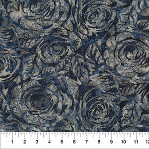 May include: Blue and white fabric with a floral pattern of roses. The roses are in a batik style with a faded, distressed look.