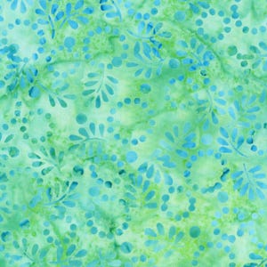 May include: A fabric featuring a batik-style pattern with a mottled light green and lime background. The design consists of repeating blue leaf-like shapes and small circular dots arranged in swirling, organic clusters across the surface.
