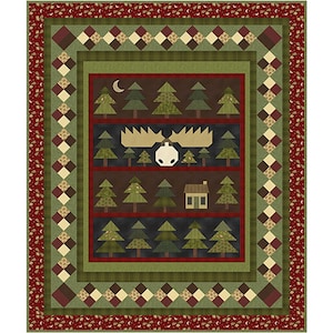 May include: A quilt with a moose head design in the center. The moose is surrounded by a forest scene with trees and a small cabin. The quilt is framed with a red, green, and brown border.