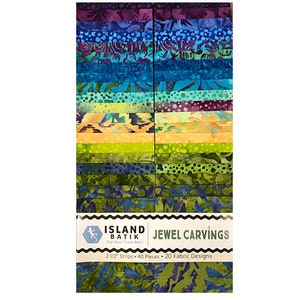 May include: A pack of 40 2 1/2 inch fabric strips in a variety of jewel tone colors and patterns. The fabric is batik and the pack is labeled "Island Batik Jewel Carvings".