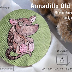 May include: Machine embroidery design of a brown armadillo with pink accents, sitting on a green background. The design is available in two sizes: 4x4 inches and 5x5 inches. File formats include DST, EXP, HUS, JEF, PES, VP3, and XXX.
