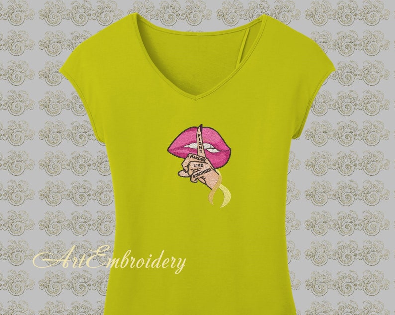 May include: Yellow t-shirt with a pink embroidered mouth with a finger over it. The finger has the text "FIGHT HARDER LIVE STRONGER" embroidered on it.