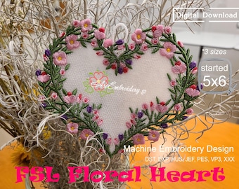 May include: A machine embroidery design of a floral heart with pink and green flowers. The design is available in three sizes, starting at 5x6 inches. The design is for use with embroidery machines and includes the file formats DST, EXP, HUS, JEF, PES, VP3, and XXX.