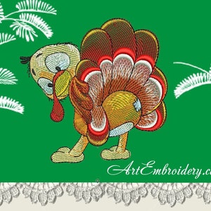 May include: Embroidered design of a cartoon turkey with a red wattle and a brown, yellow, and red patterned tail feathers. The turkey is standing on a green background with white leafy branches.