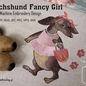 May include: Machine embroidery design of a dachshund wearing a pink dress and holding a red purse. The design is available in three sizes: 4x5 inches, 5x7 inches, and 6x8 inches.  DST, EXP, HUS, JEF, PES, VP3, XXX.