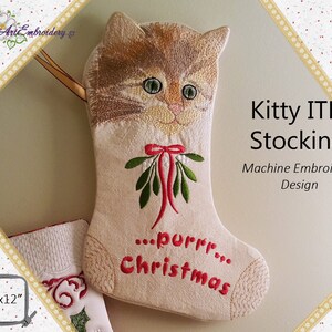May include: A white stocking with a cat face embroidered on the top. The stocking has a red bow with green holly leaves and berries. The stocking says "...purrr...Christmas" in red embroidery. The stocking is 8x12 inches. The text "Kitty ITH Stocking Machine Embroidery Design" is in the upper right corner of the image.
