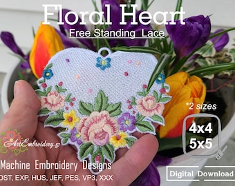 May include: White heart-shaped free-standing lace embroidery design with floral details. The design features pink, yellow, and purple flowers with green leaves. The design is available in two sizes: 4x4 inches and 5x5 inches.  The text "Floral Heart" and "Free Standing Lace" is at the top of the image. The text "*2 sizes" is at the top right of the image. The text "4x4" and "5x5" is in a square at the bottom right of the image. The text "Digital Download" is at the bottom right of the image.