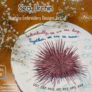 May include: Machine embroidery design set featuring a pink sea urchin with the quote "Individually, we are one drop. Together, we are an ocean." in blue cursive text. The design is available in two sizes up to 8x8 inches.