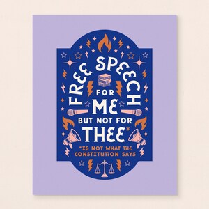 May include: A rectangular print with a light purple background. The print features a dark blue oval shape with the words "FREE SPEECH FOR ME BUT NOT FOR THEE" in white. The text is surrounded by stars, lightning bolts, and other graphics.